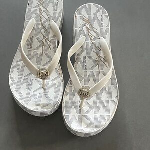 New w/o tags Michael Kors White Flip Flops